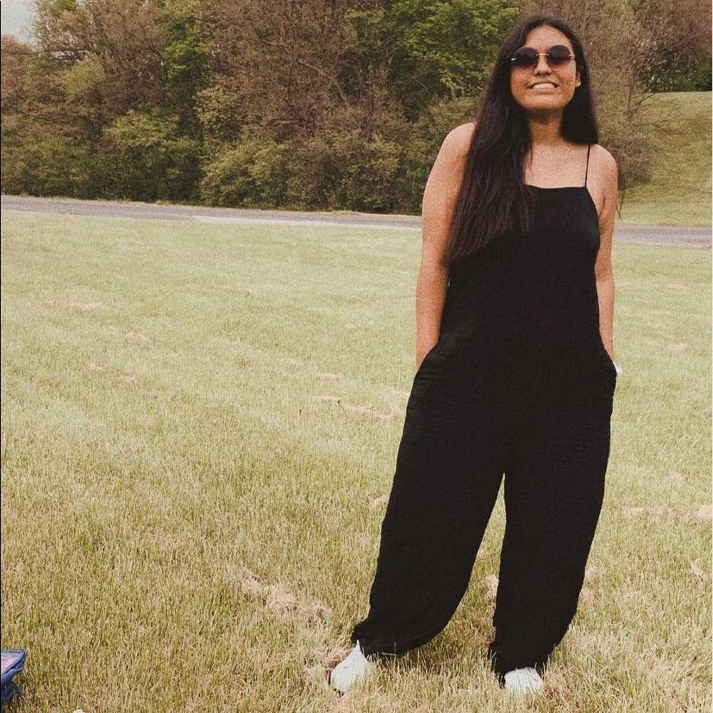 Black Romper with pockets. Size Large.